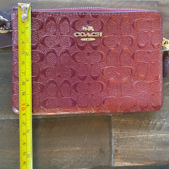Authentic Coach burgundy/wine/ shimmery wristlet . - Picture 4 of 5